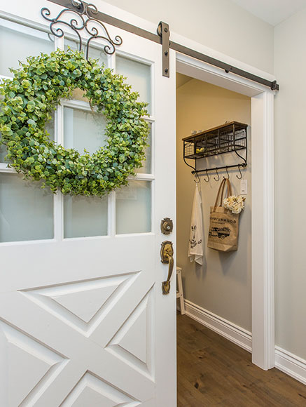 Mudroom with barn look sliding door